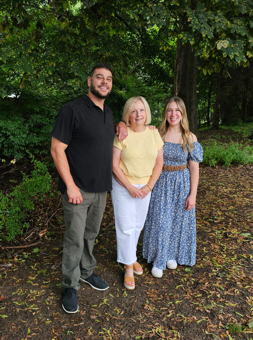 Limitless Real Estate Group agents Shane Shannon, Kathy Archer, and Sarah Jobin Spaller standing together outdoors in Northeast Ohio.
