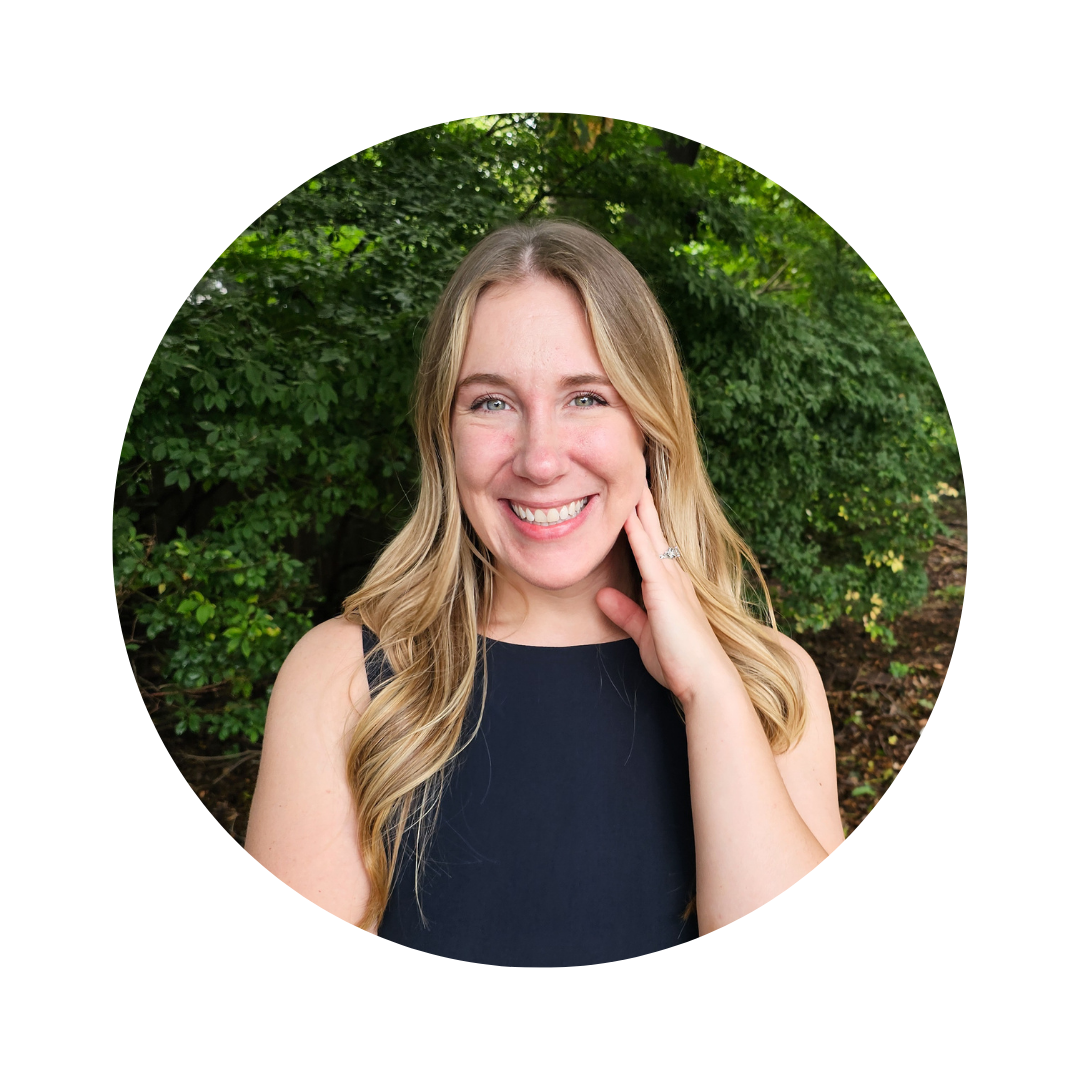 Sarah Jobin Spaller, licensed Northeast Ohio Realtor with Limitless Real Estate Group, smiling outdoors in a navy sleeveless dress.